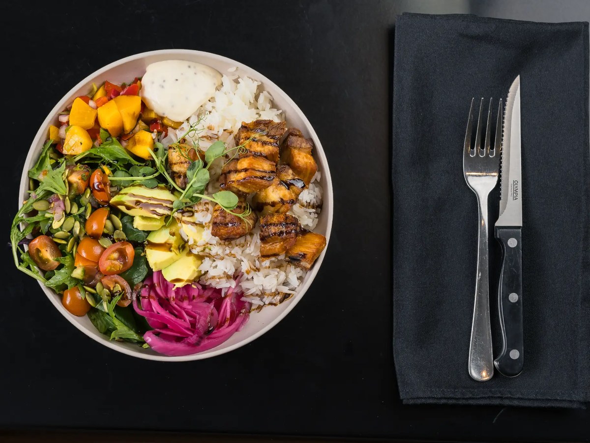 Harvest bowl with pork belly, avocado and rice